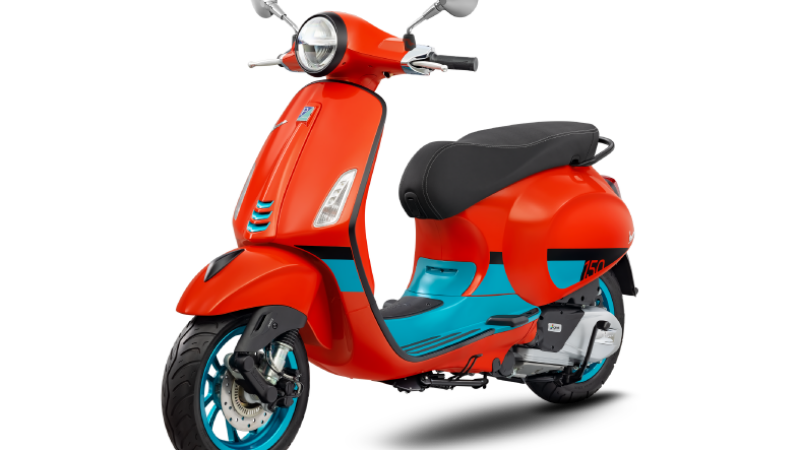 Vespa primavera color vibe orange-tramonto
